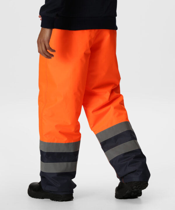 TRJ Regatta Pro Hi Vis Insulated Overtrousers Orange/Navy - Image 2